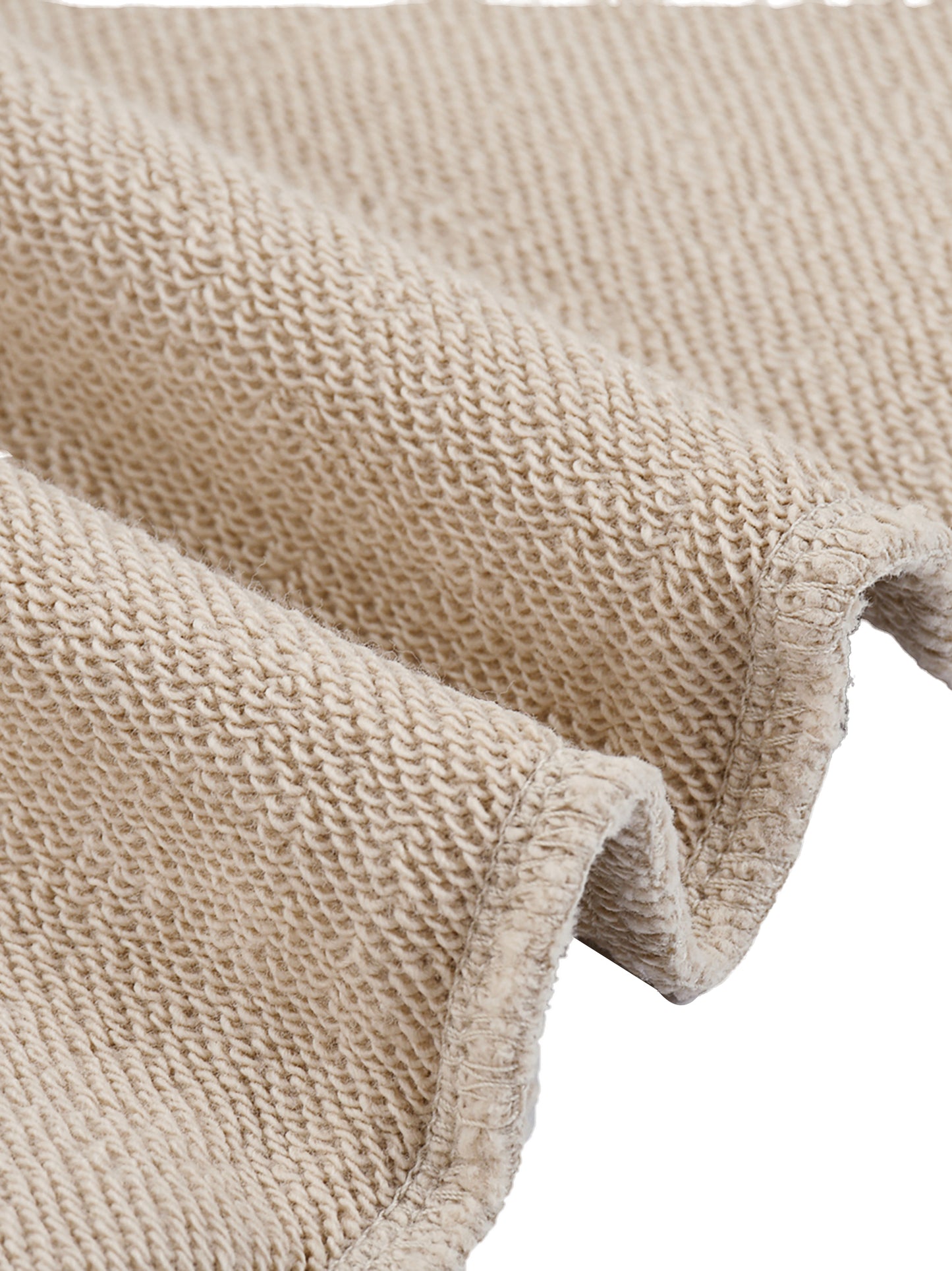 Stone sweatshirt hem and cuff detail with textured knit finish