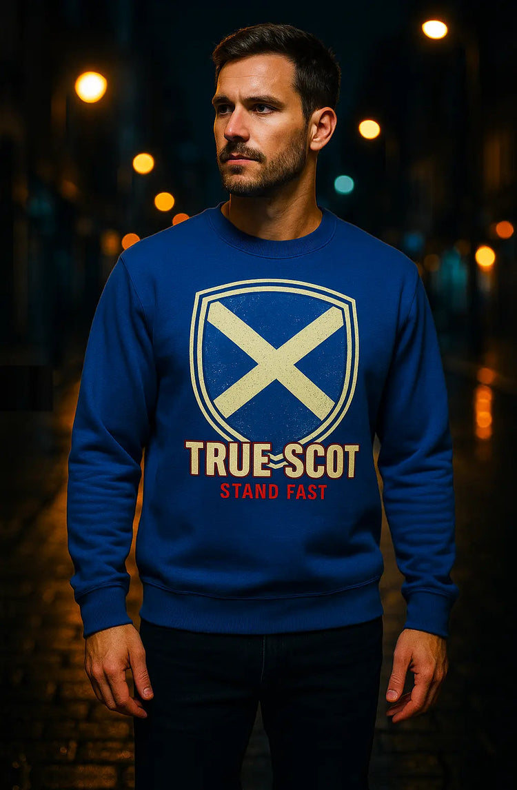 Man wearing True Scot Stand Fast blue sweatshirt with Scottish flag shield design - Scotland heritage apparel by Celtic Wolfwear