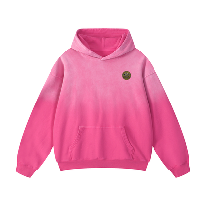 Pink oversized hoodie with hood, front pouch pocket, and small chest logo patch