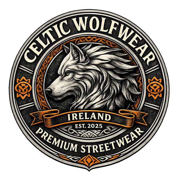 A circular Celtic wolf graphic with a detailed black and white wolf head illustration, surrounded by the text 'CELTIC WOLFWEAR' and 'PREMIUM STREETWEAR,' with 'IRELAND EST. 2025' on a banner across the center, set against a muted blue-gray background.