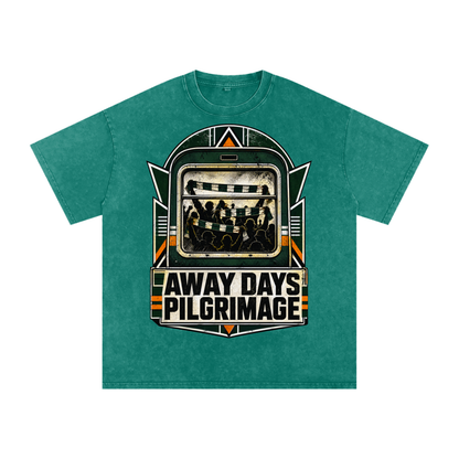 Oversized cotton T-shirt in teal-green with large front event graphic in green and black