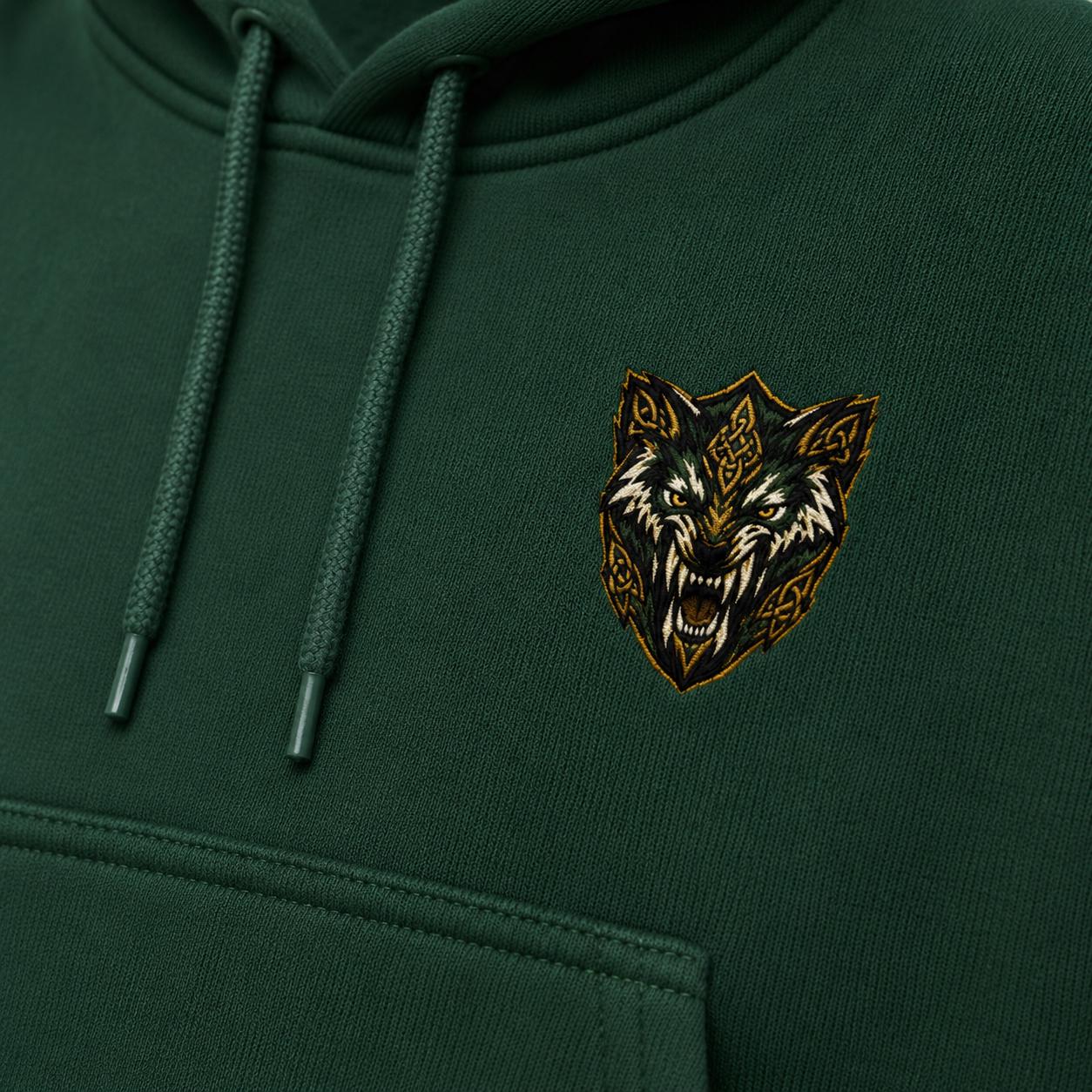 Forest green hoodie close-up of gold wolf crest near the front pocket area