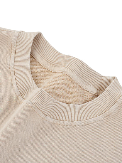 Stone oversized sweatshirt collar close-up, ribbed crew neck and seams