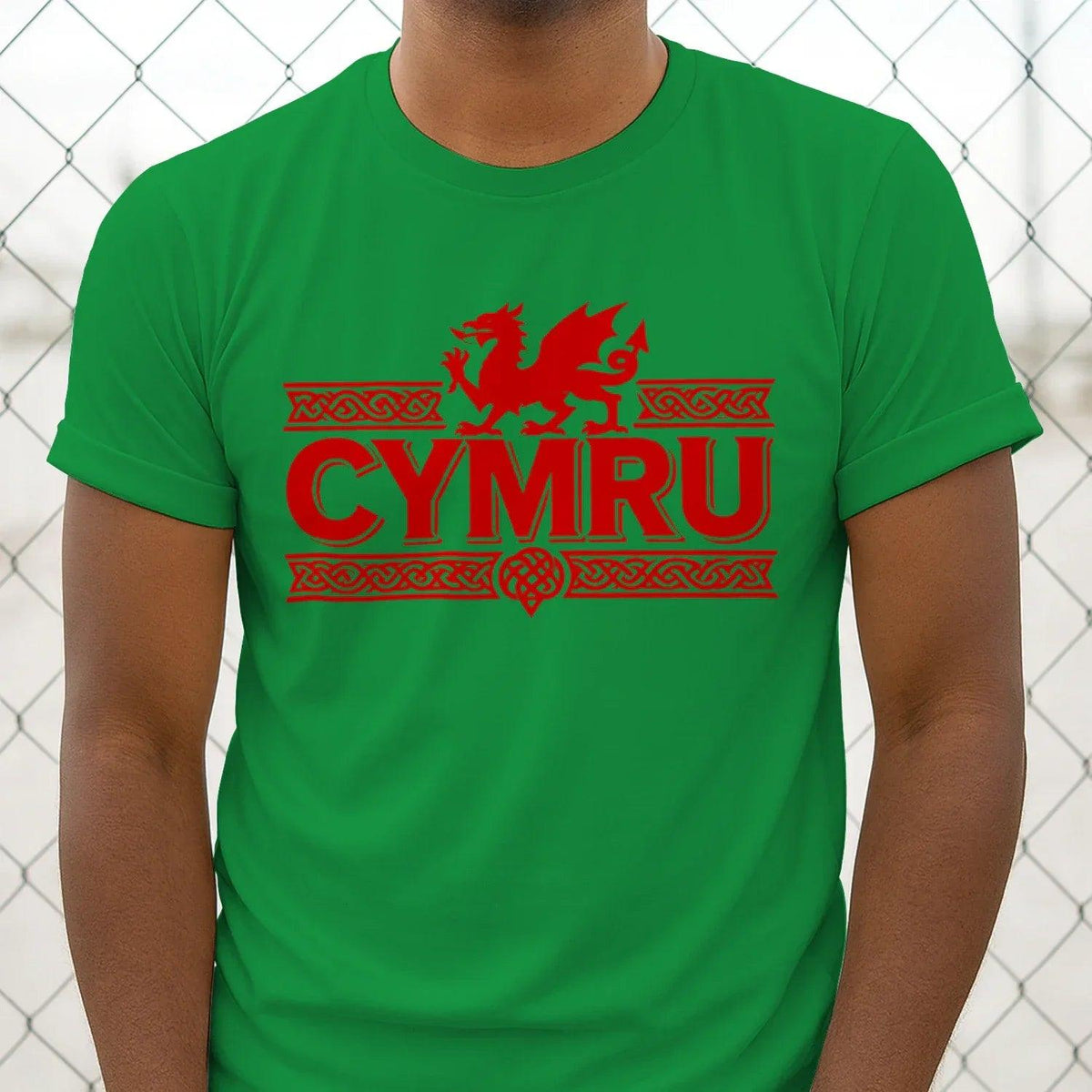 Green T-shirt with red “CYMRU” text and dragon emblem centered on front
