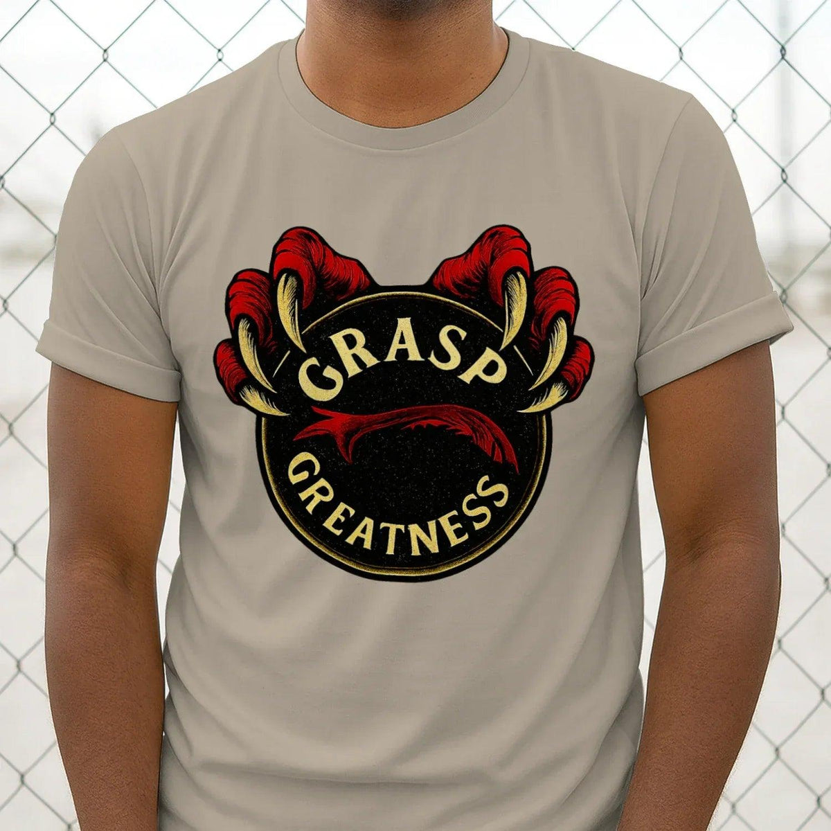 Grey t-shirt with close-up circular claw graphic and bold text emblem on front