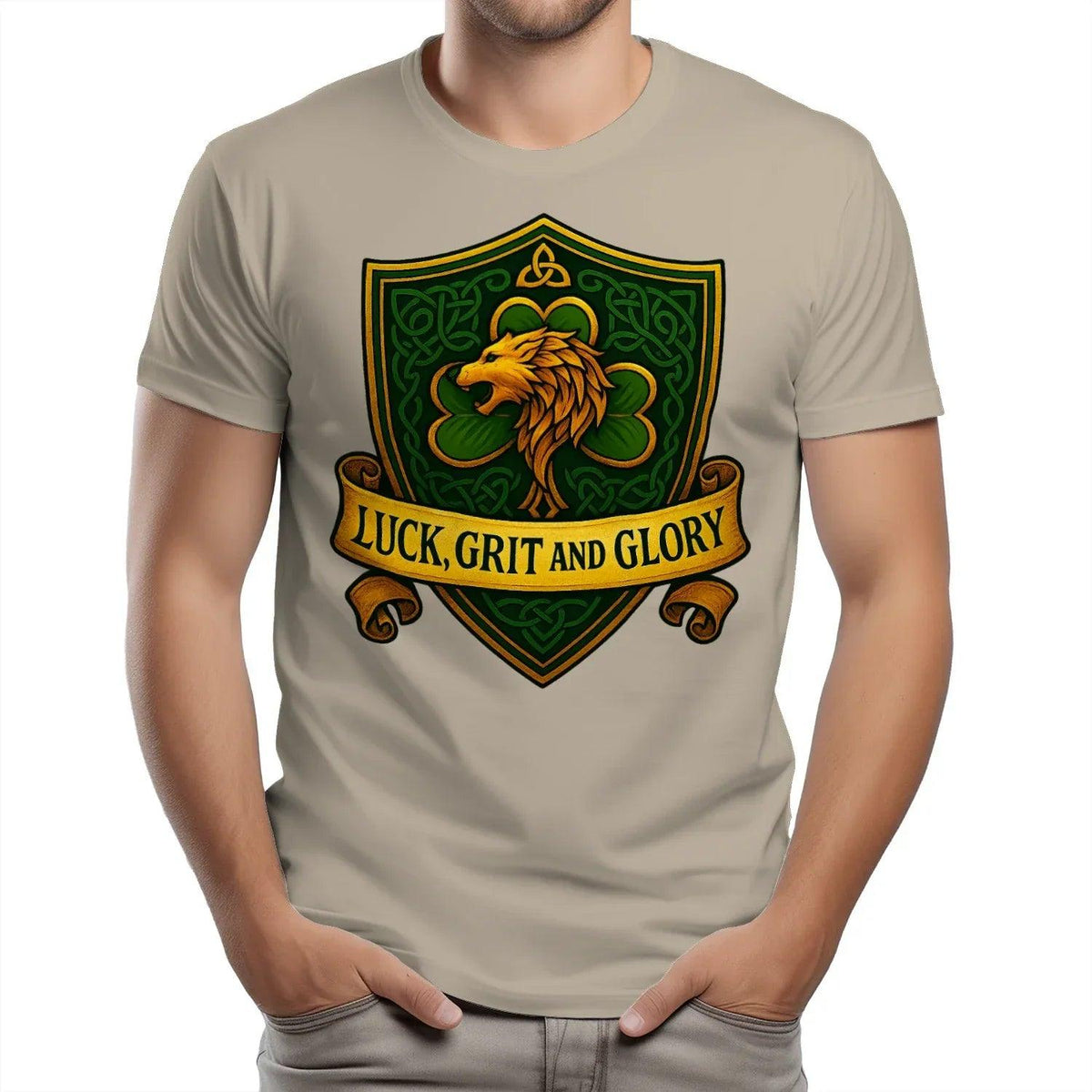Light tan heavy T-shirt with lion shield graphic: 'LUCK, GRIT AND GLORY'