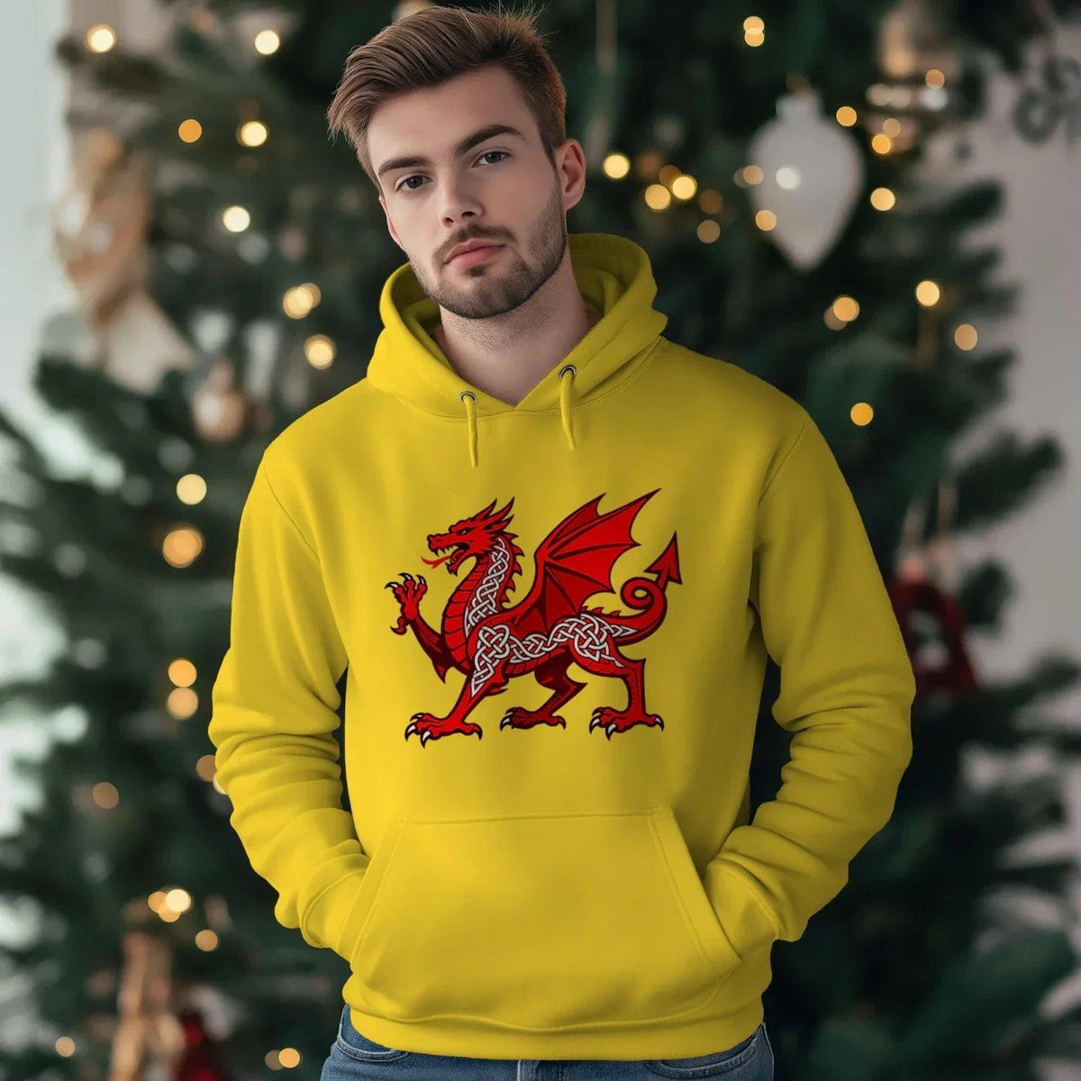Bright yellow pullover hoodie with hood strings and red dragon crest on chest