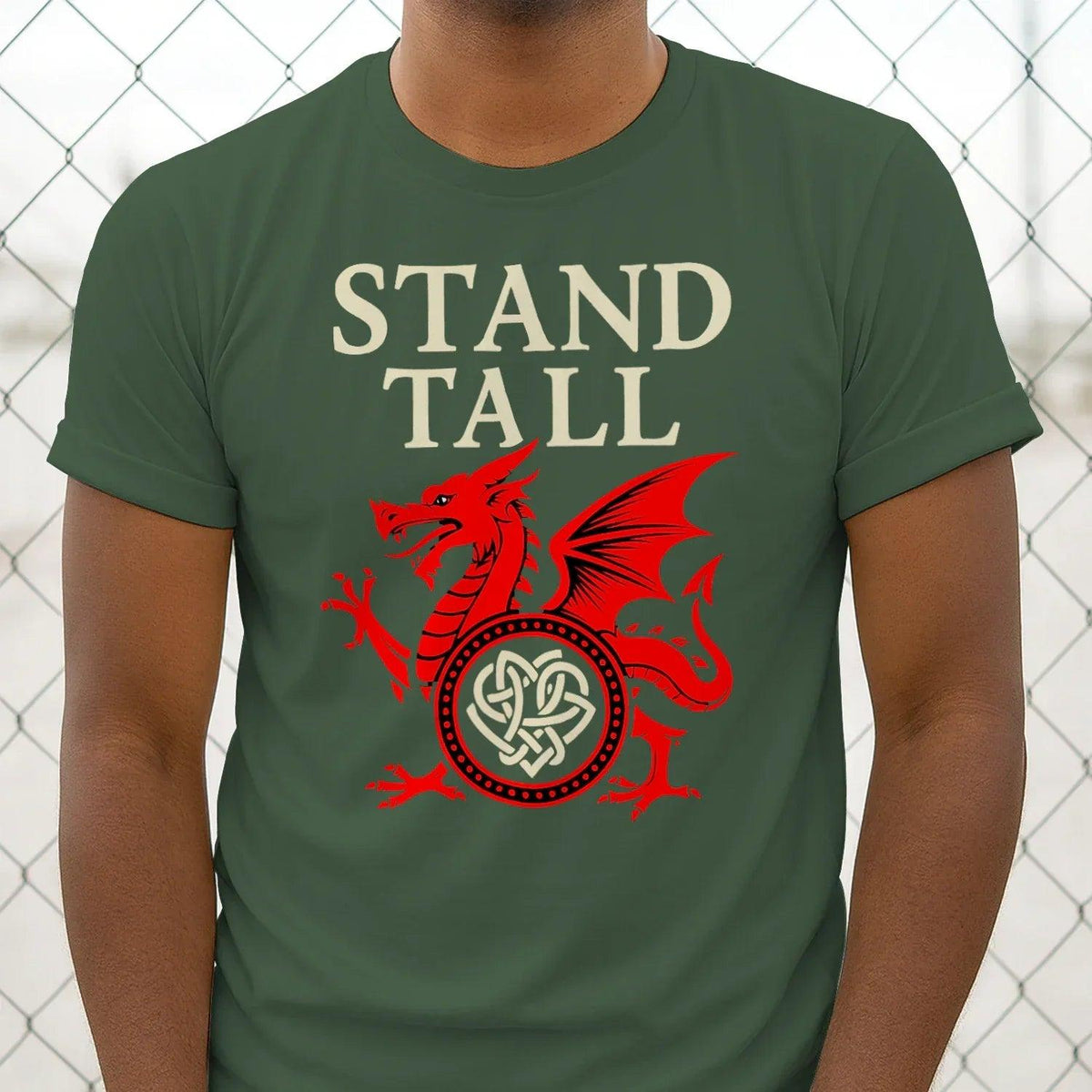 Dark green T-shirt with red Welsh dragon crest and light “STAND TALL” text