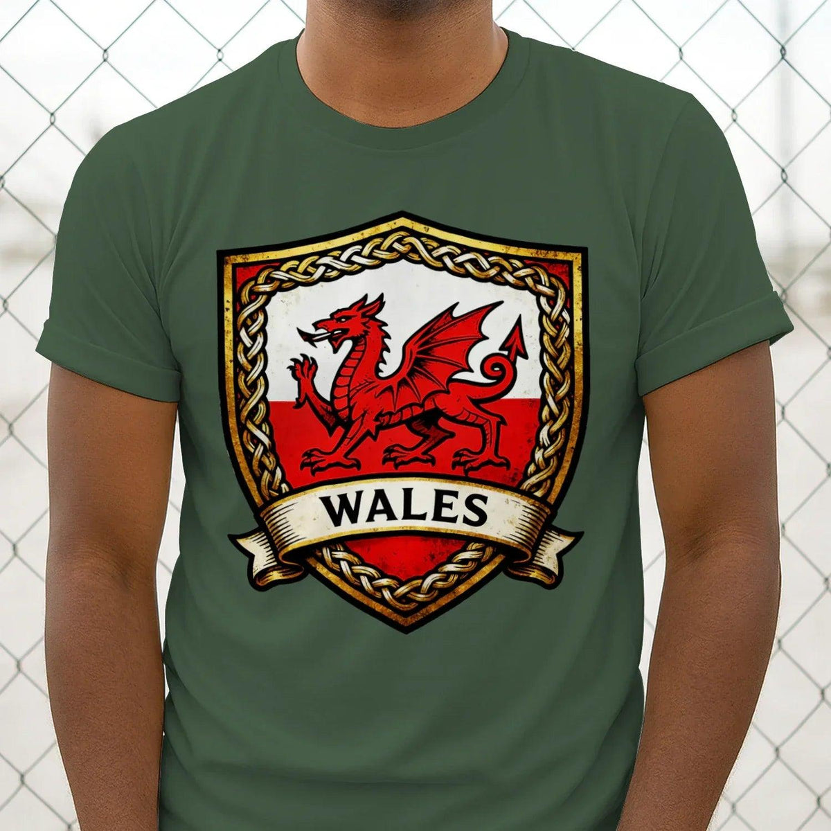 Dark green Wales heraldic shield dragon T-shirt with gold-trim crest graphic on chest.