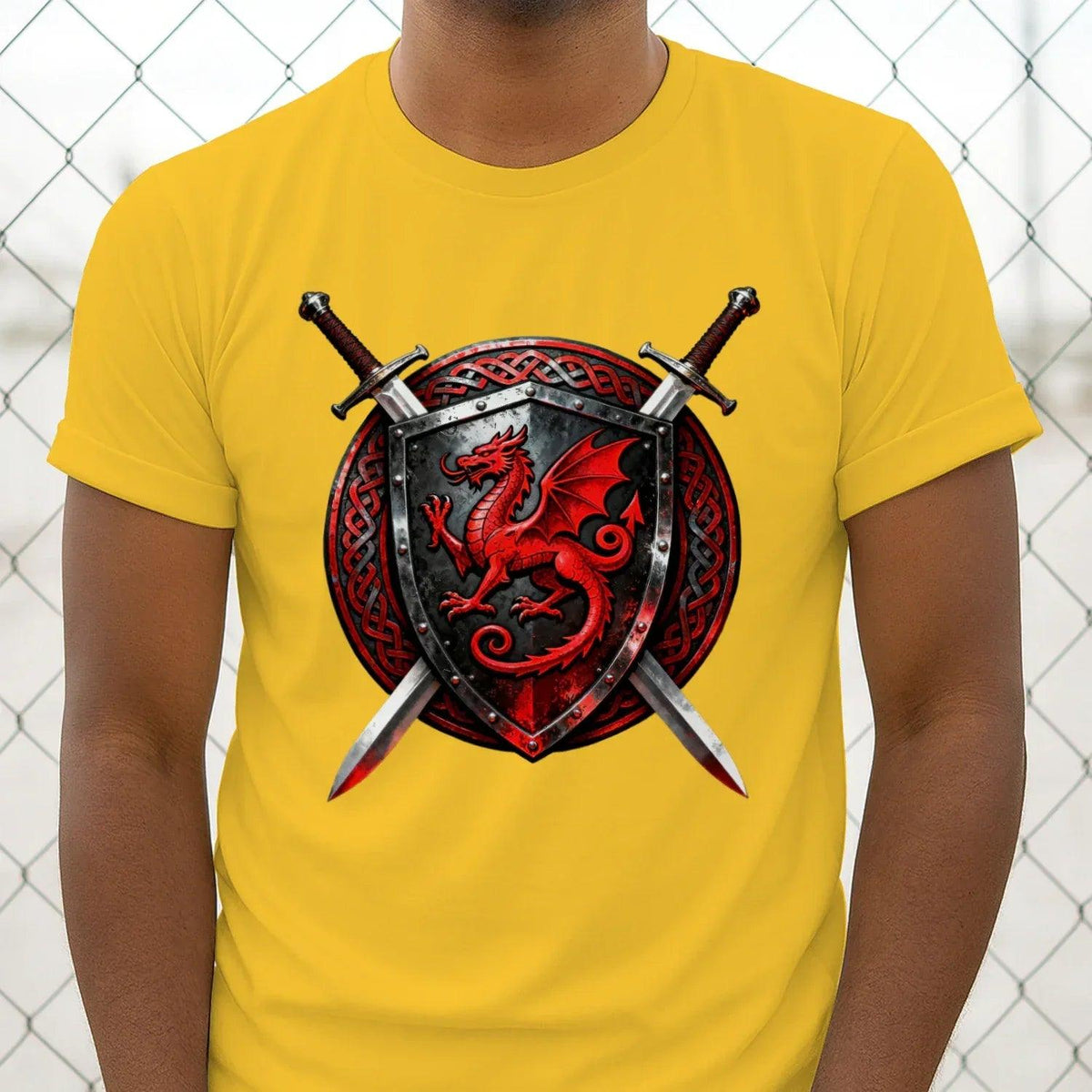 Yellow crew-neck graphic T-shirt with large dragon shield and crossed swords chest print.