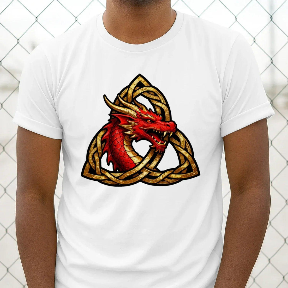 White unisex T-shirt with centered red dragon and gold Celtic knot triquetra design