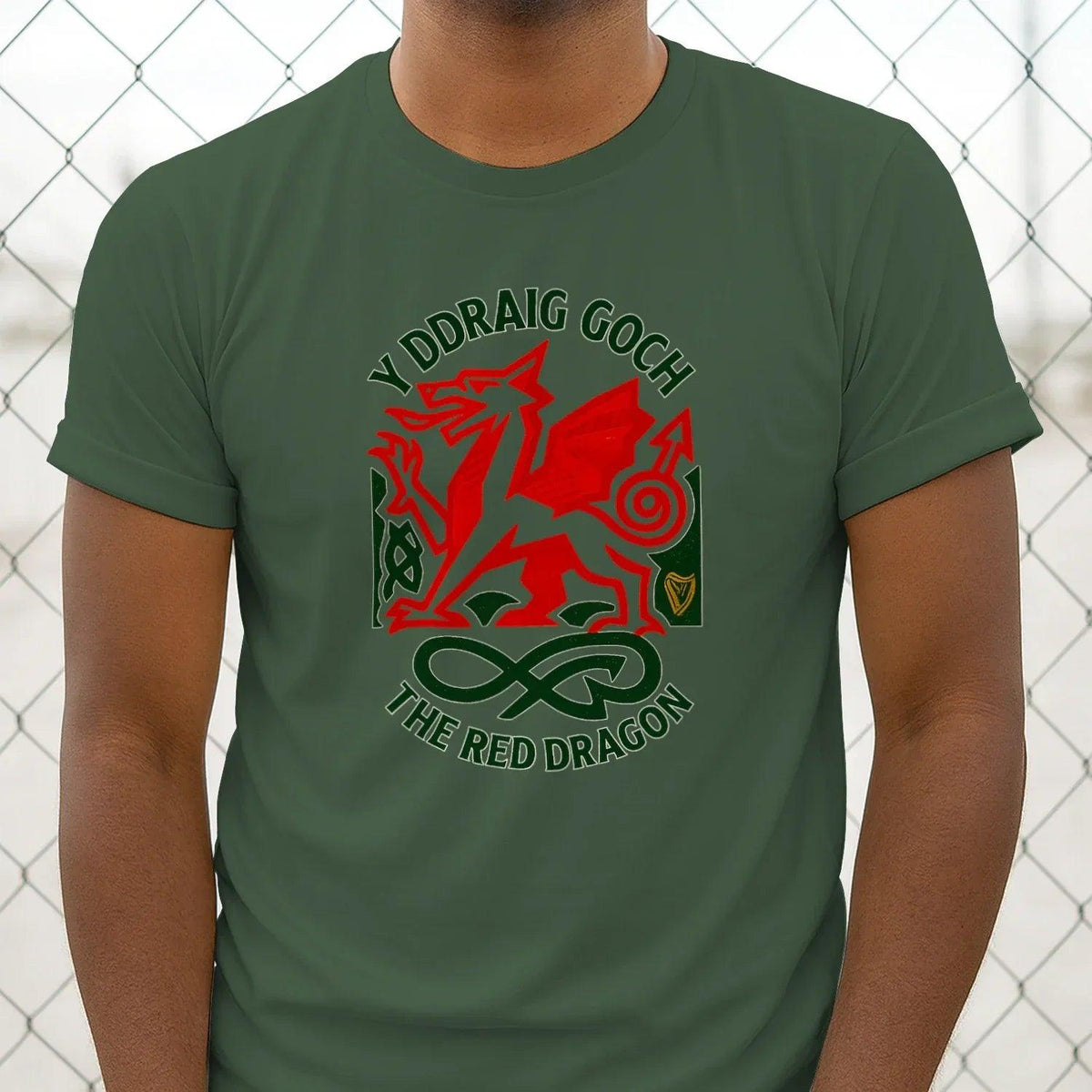 Forest green dragon crest graphic T-shirt with centered logo