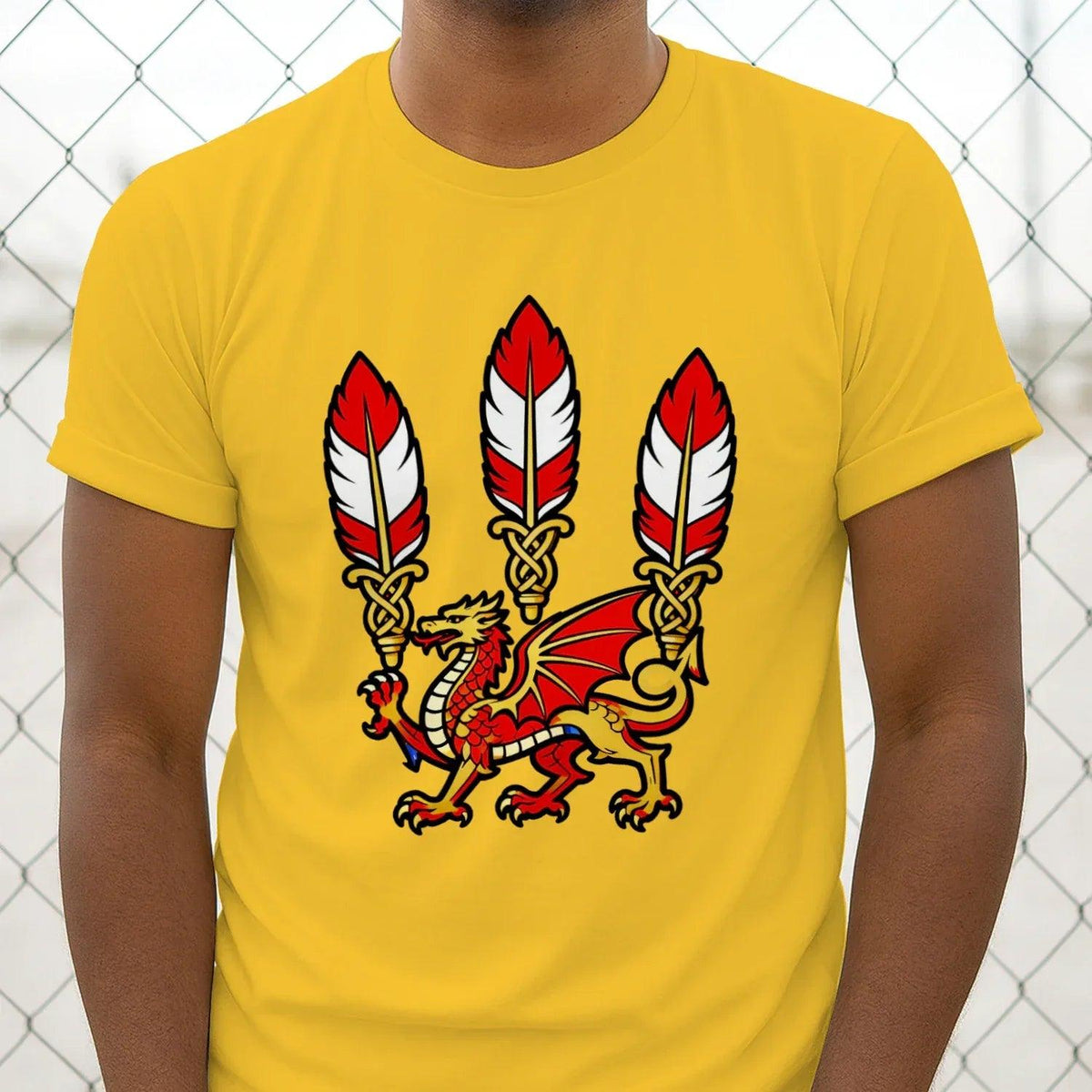 Yellow crew-neck graphic T-shirt with three feather icons and Welsh dragon front graphic