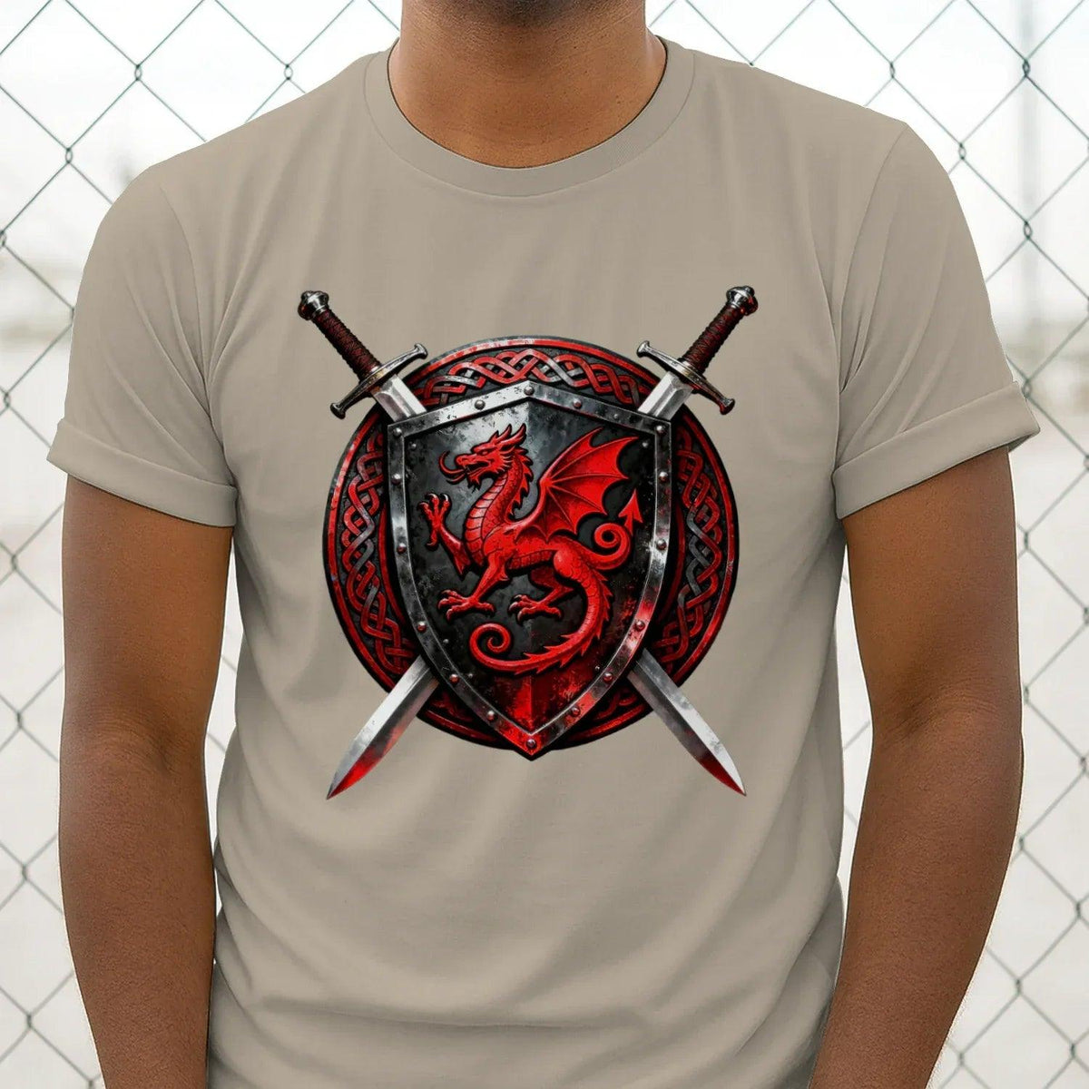 Light tan T-shirt with centered red dragon shield and crossed swords chest graphic