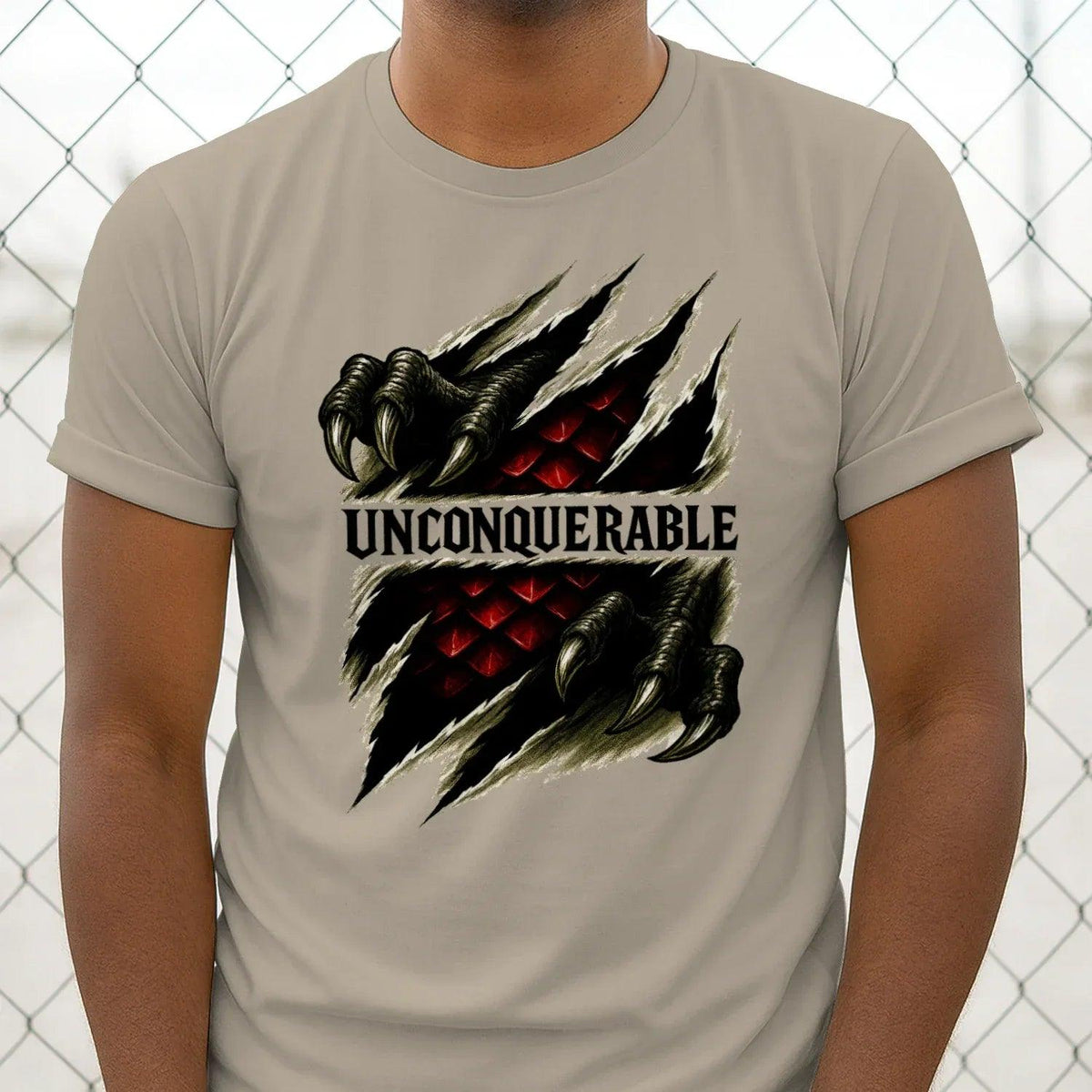Sand crew-neck T-shirt with dragon claw emblem and UNCONQUERABLE lettering on chest