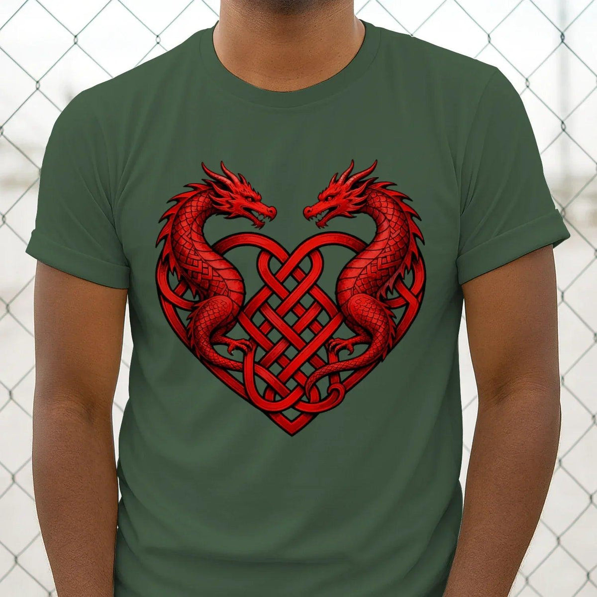 Dark green T-shirt with centered red double-dragon heart and Celtic knot emblem