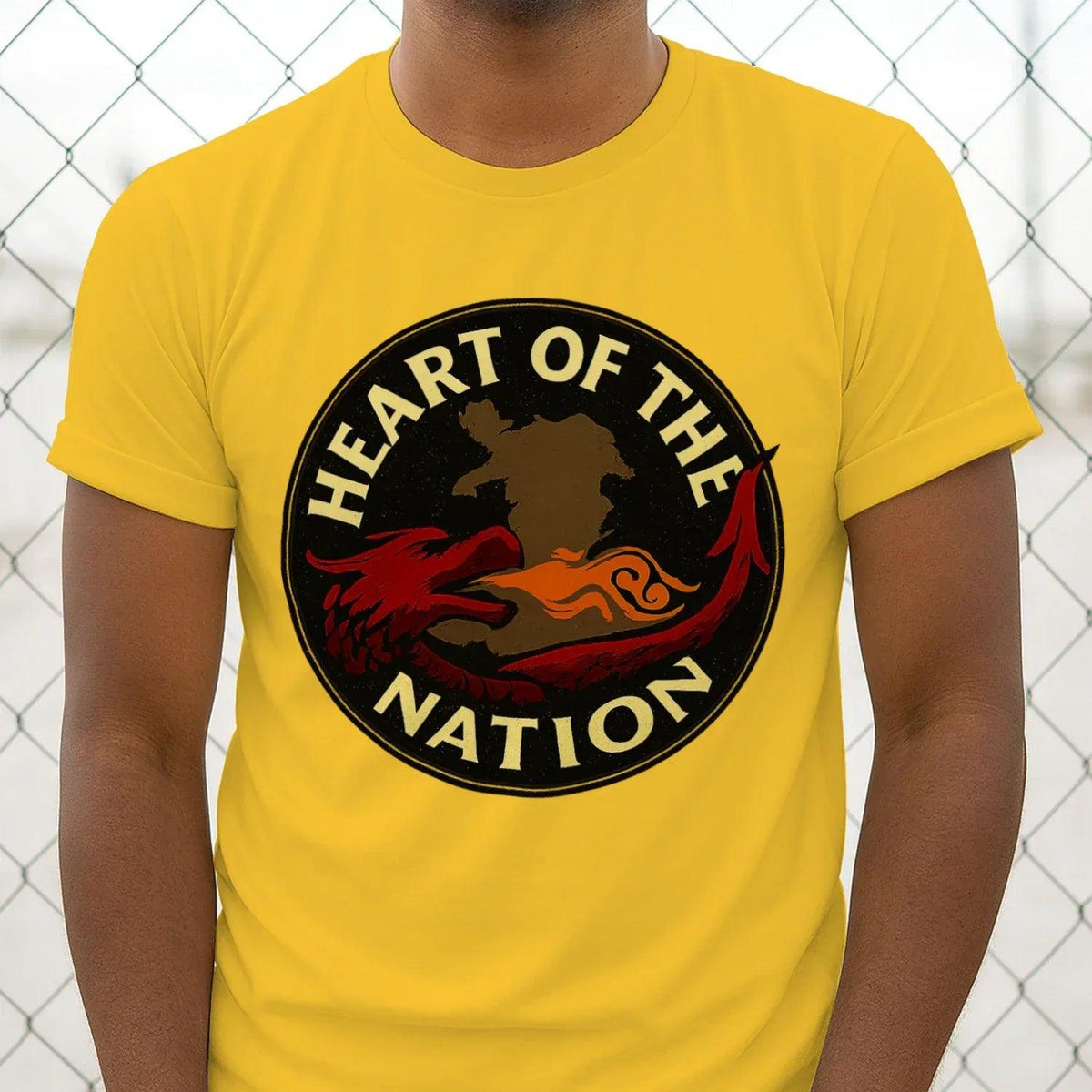 Yellow Welsh dragon graphic T-shirt with round Heart of the Nation emblem