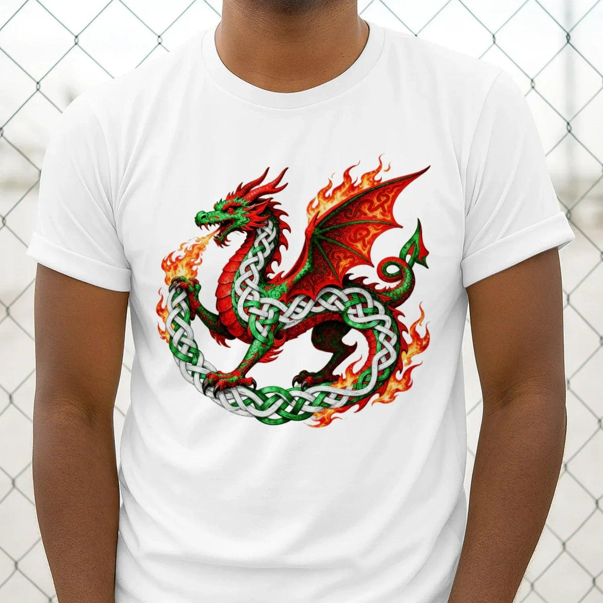 White T-shirt with dragon flame graphic and green celtic knot