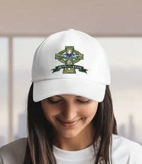 White baseball cap worn by model with embroidered Scotland Celtic cross crest
