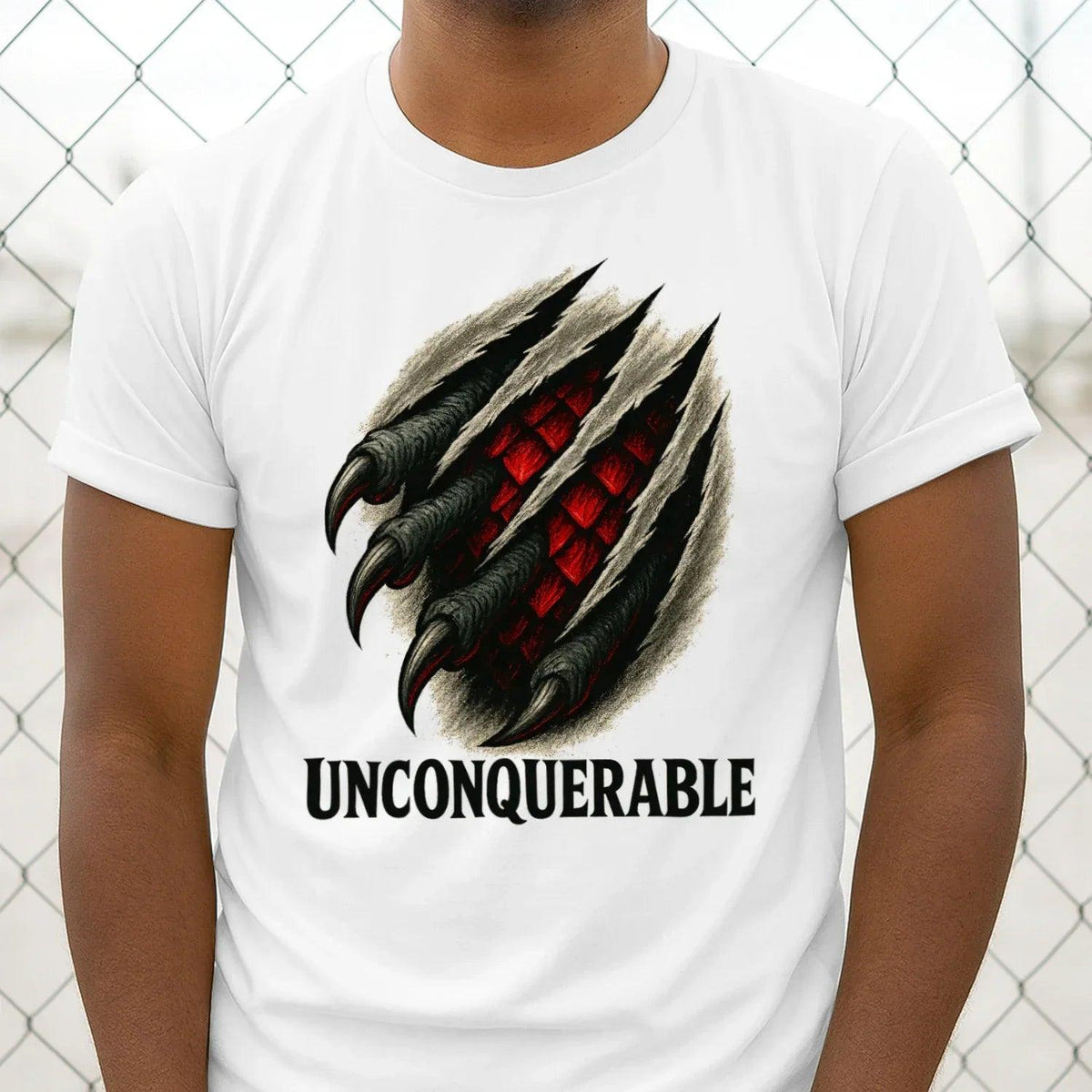 White cotton T-shirt with black dragon claw graphic and UNCONQUERABLE lettering