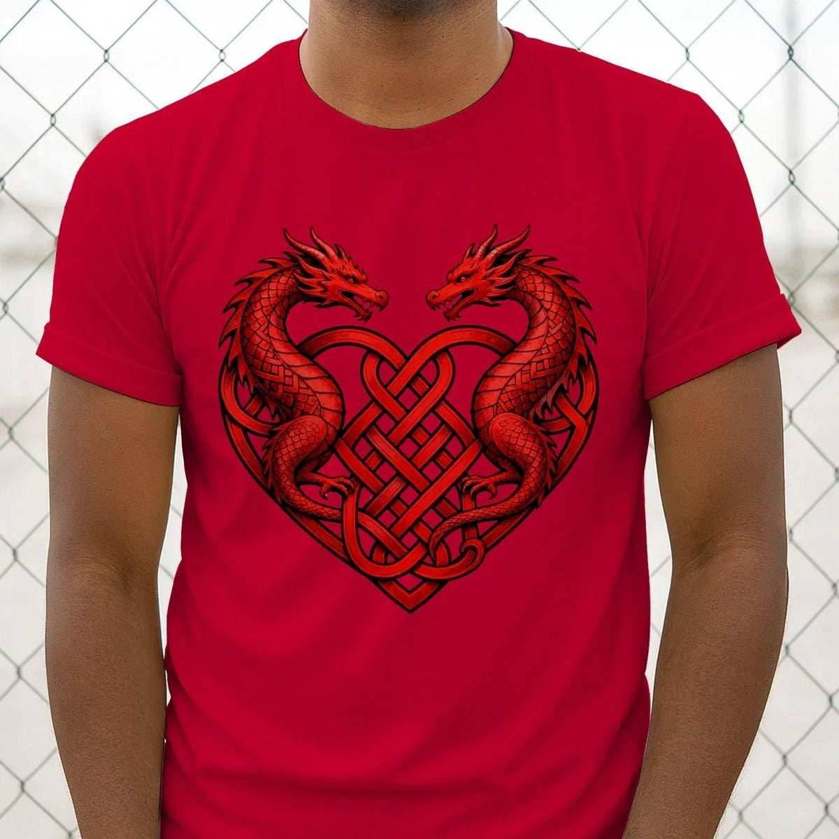 Red T-shirt front with red dragon-heart emblem and interwoven Celtic knot design