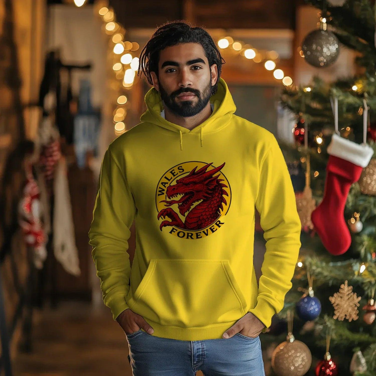 Yellow cotton hoodie with Wales Forever dragon graphic on chest, kangaroo pocket, drawstring hood.