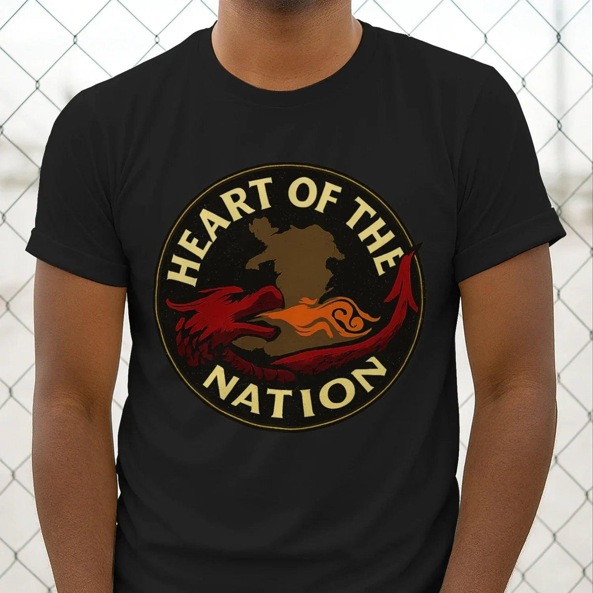 Black T-shirt with round “Heart of the Nation” dragon emblem graphic on chest