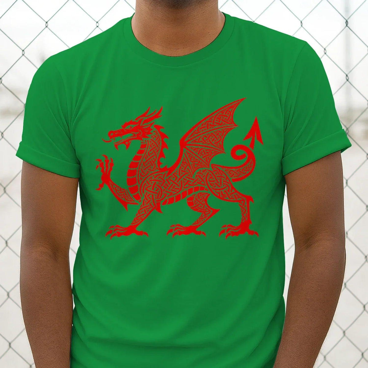 Green T-shirt with large red Celtic dragon knot graphic on chest